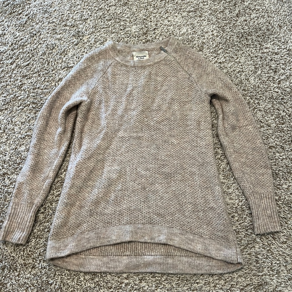 Abercrombie women’s tan knitted sweater with zipper on side collar.